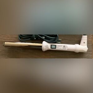 Gently used L’ange 
Titanium Curling Wand